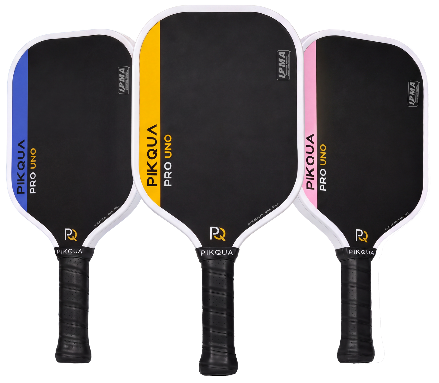 Three pickleball paddles shown side by side on a white background: a blue-bordered Pikaqua Pro Uno Kevlar, a yellow-bordered Pikaqua Pro Uno Kevlar, and a pink-bordered Pikaqua Pro Uno Kevlar. Each paddle has a black face, white edge trim, black wrapped handle, and visible IPMA certification and Pikqua branding.